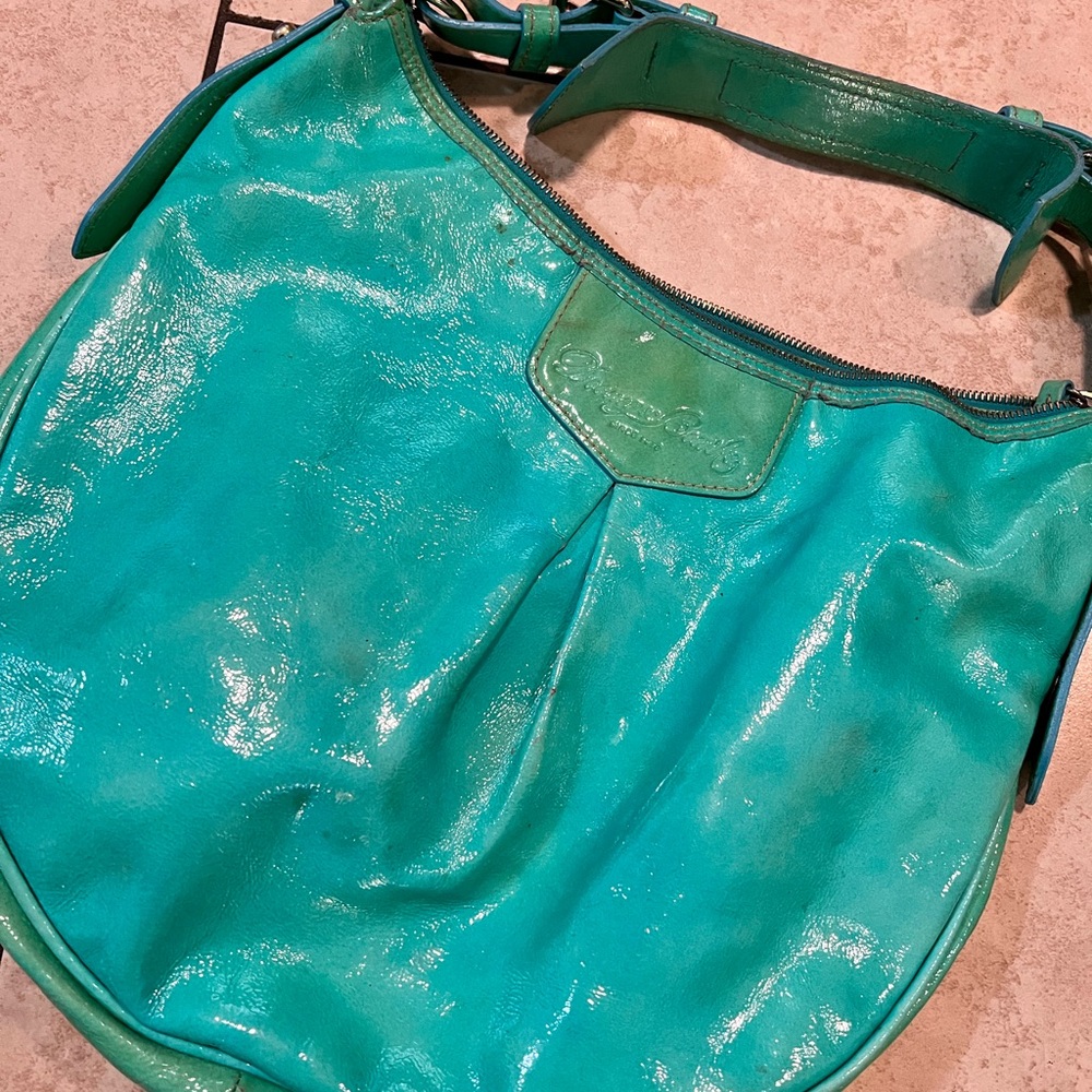 Dooney and Bourke Luisa Aqua handbag with flaws